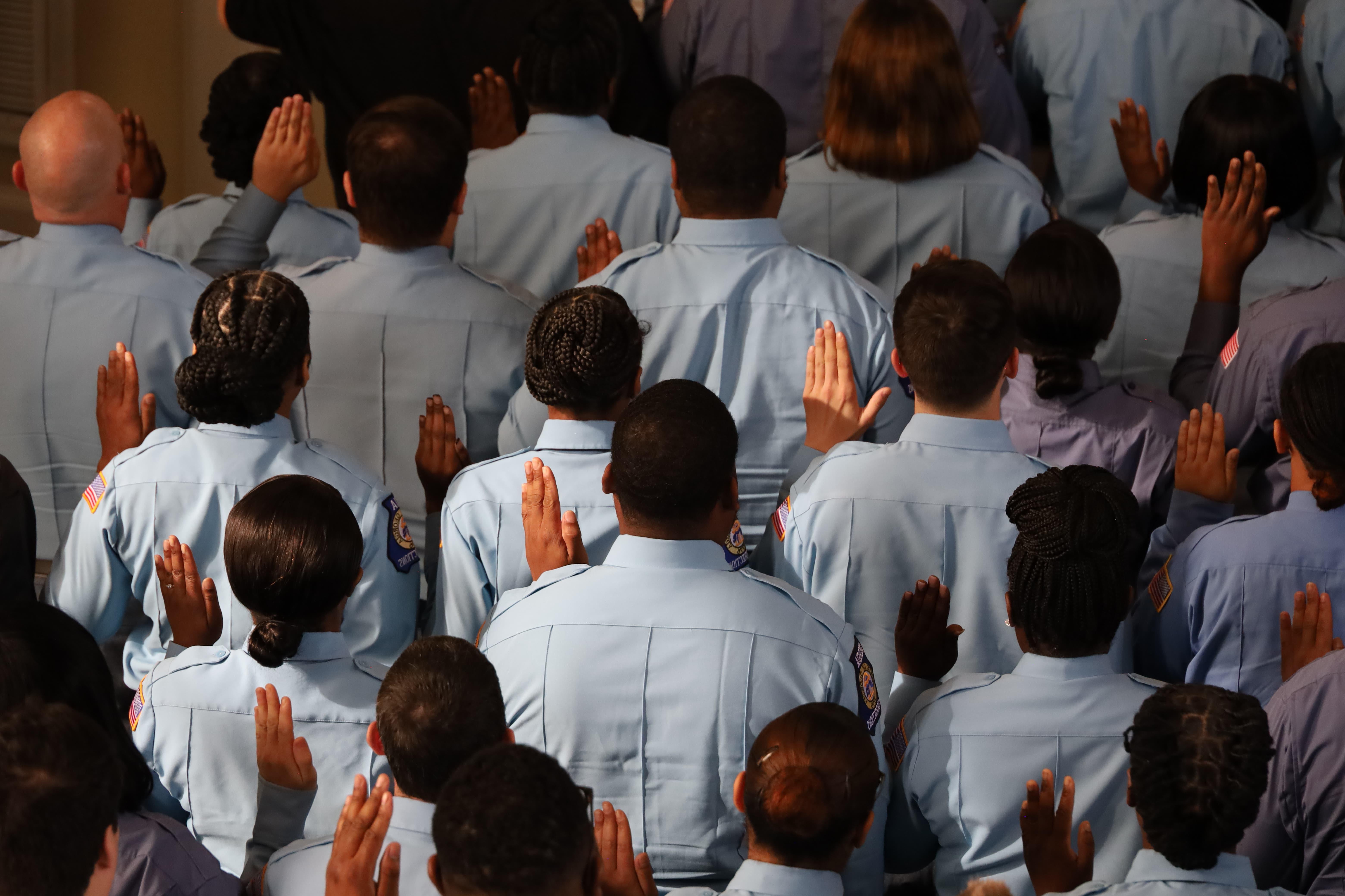 Group of GDC cadets being sworn in.